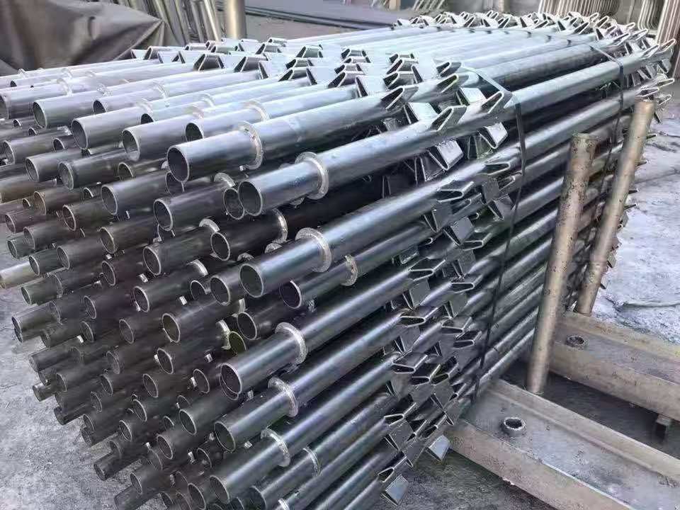 Wedge lock scaffolding verticals with spigot ends in warehouse