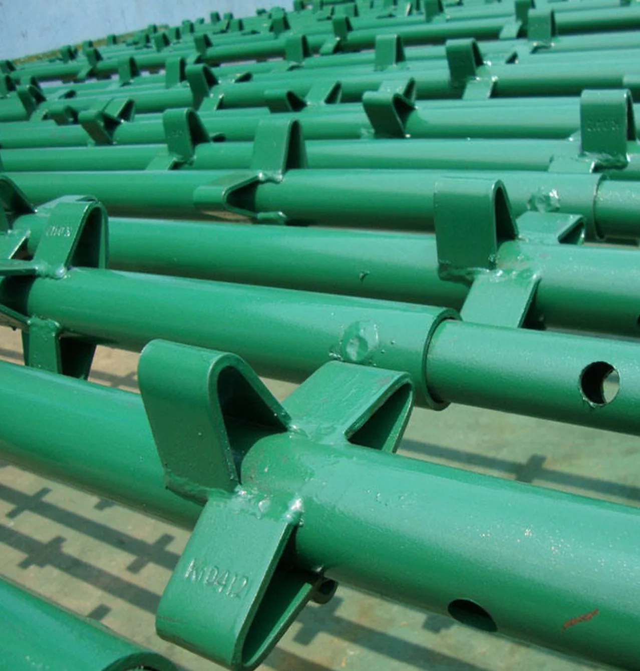 Kwikstage wedge-lock scaffolding frame with diagonal brace and hop-up bracket